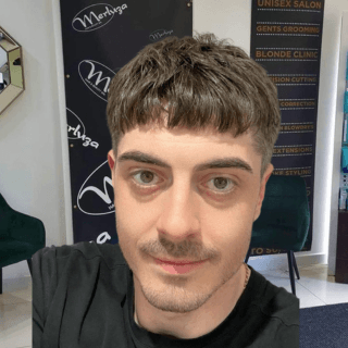 James, Creative Director at Merluza Hair & Beauty in Hall Green, Birmingham – expert in transforming looks through cutting, styling, and colour with a strong client-focused approach.